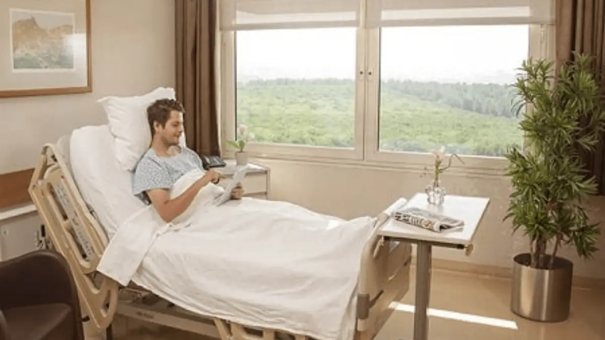 Inpatient room at Anadolu Medical Center, with a view of the forest